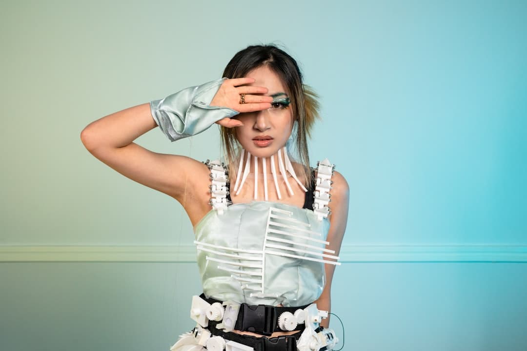 a woman with her hands on her head